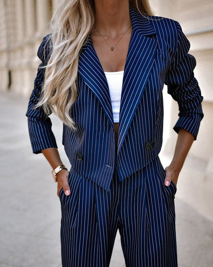 Stylish striped suit set with cropped top and straight-leg pants in a variety of classic colors