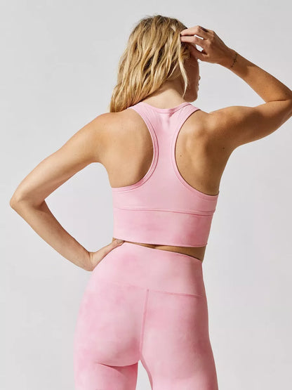 Sleeveless pink nylon yoga suit with moisture-wicking fabric for workouts