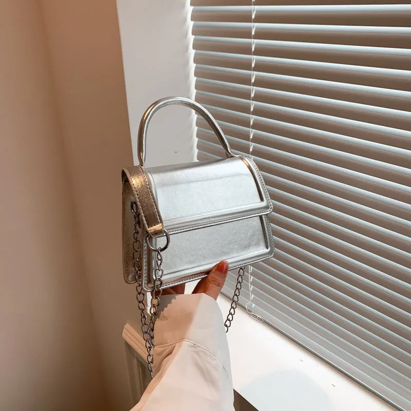 Retro shoulder bag casual handbag fashion simple crossbody PU leather street trend style horizontal square shape with sewing line details for daily matching, available in silver, black, purple, green, gold, and orange colours.