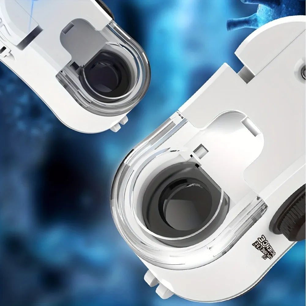 White mini mobile phone microscope with LED light and detachable clip-on adapter next to a smartphone.