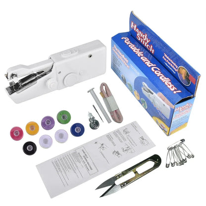 Black handheld electric sewing machine with ruler, scissors, and thread coils on white background