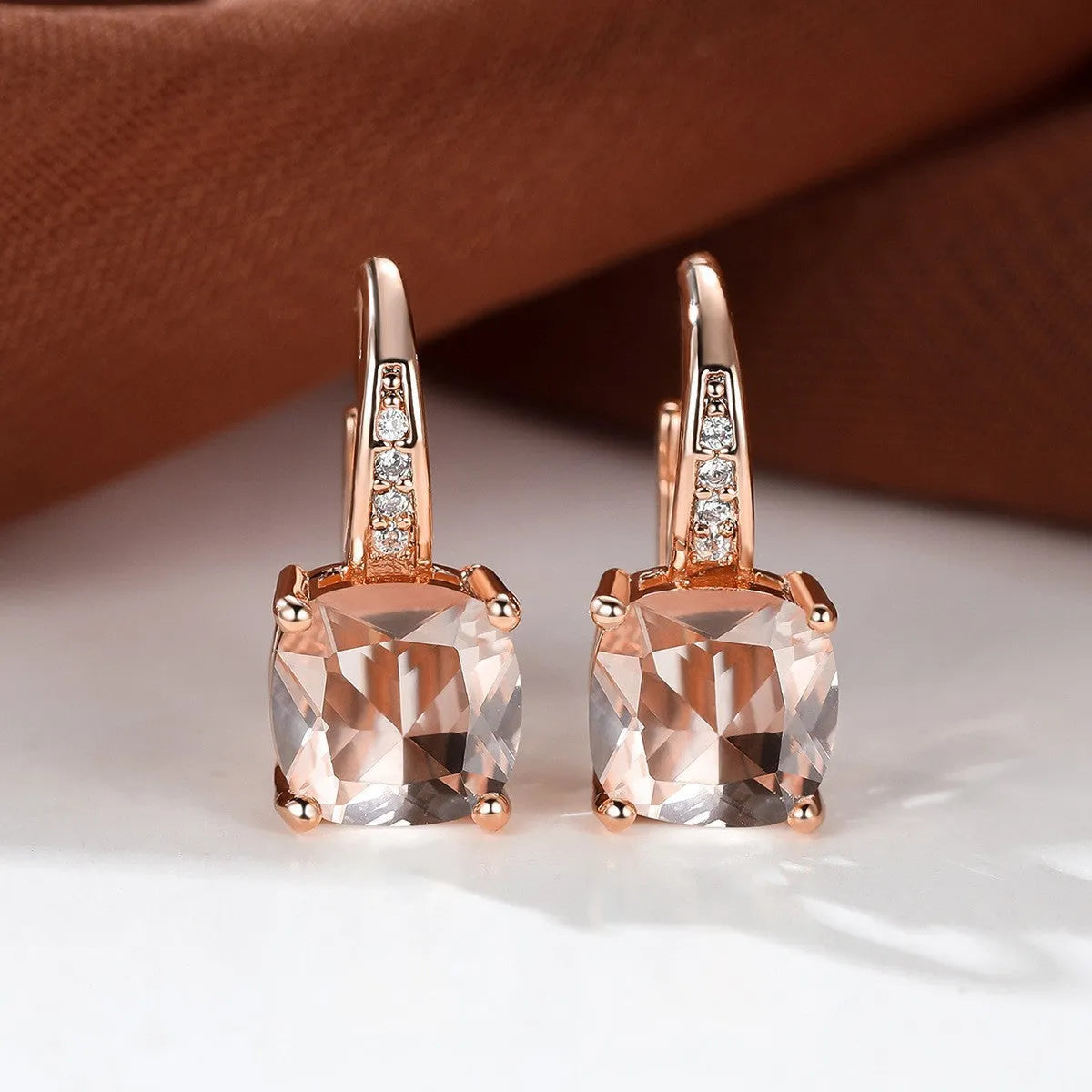 Square zircon inlaid ear hook earrings with geometric design and electroplated finish in golden tone