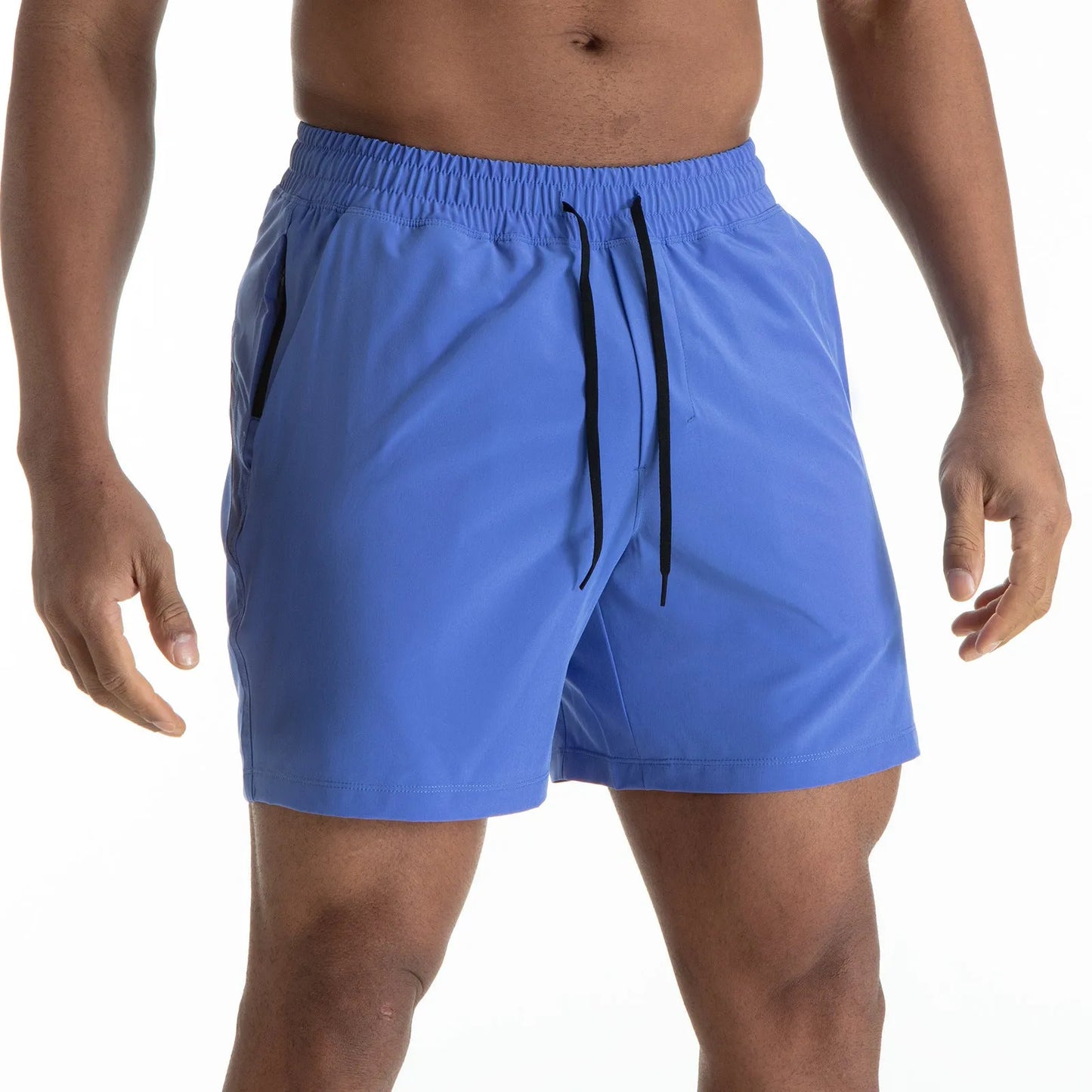 Man wearing black quick-dry polyester sports shorts suitable for running or gym workouts.