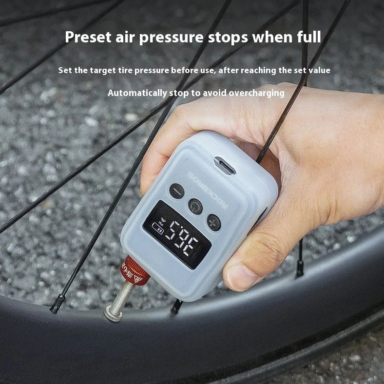 Black portable electric bike pump with TYPE-C charging port and multiple inflation nozzles