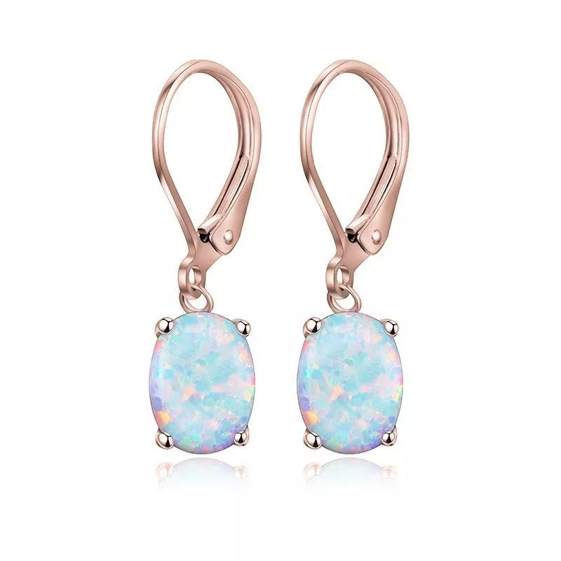 Four-claw oval opal earrings in gold, rose gold, or silver with electroplated finish