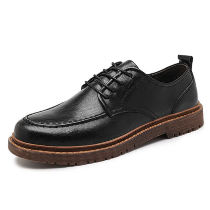 Brown casual leather shoes with round toe, flat heel, and visible sewing lines on the cowhide upper.
