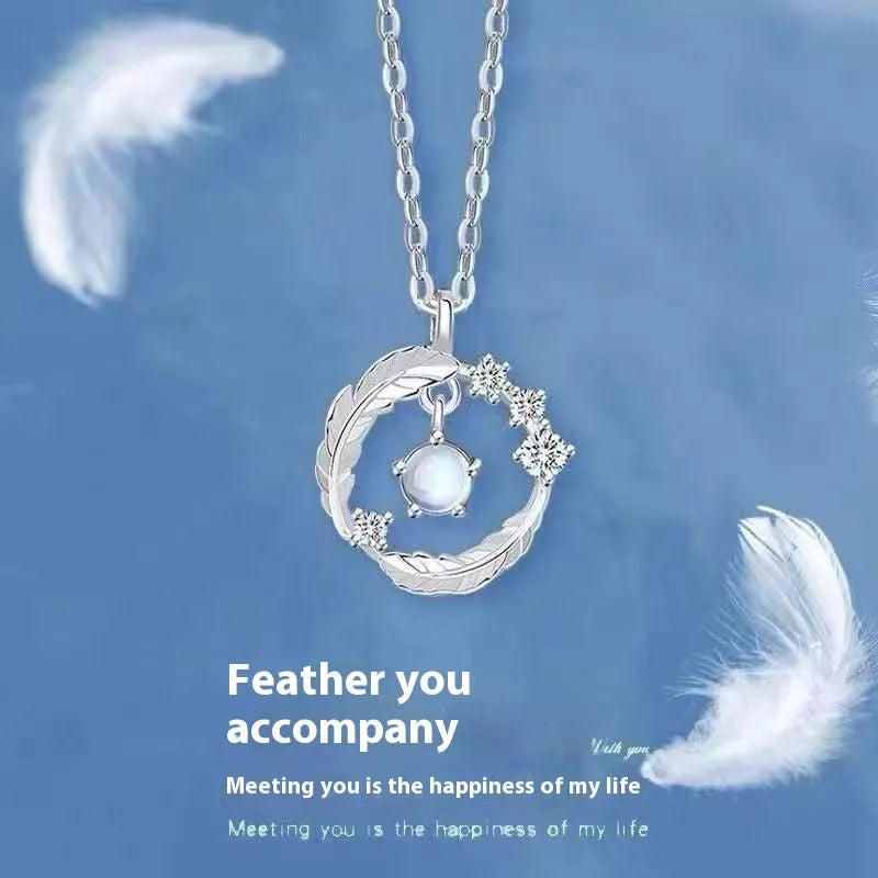 925 silver plated feather pendant necklace with color-changing moonstone bead