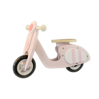 Pink wooden balance scooter for toddlers measuring 10 inches, designed for children aged 1-6 years
