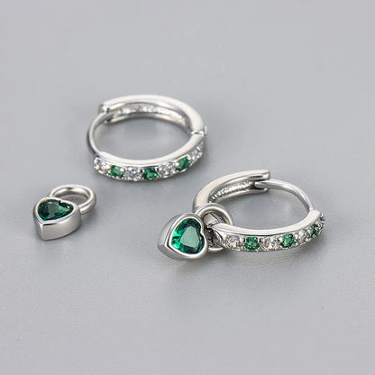 Fashion zircon earrings with 10mm heart-shaped drops in gold and white gold settings, showing diamond-treated stones