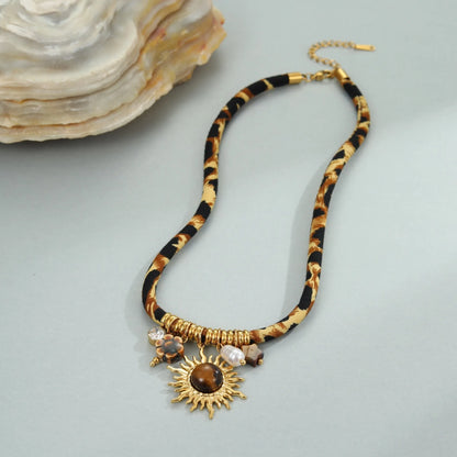 Women's stainless steel necklace with geometric leopard pendant and gold electroplated chain