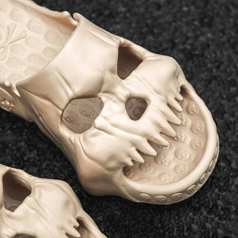 Spooky skull-printed slide sandals in various colors and sizes