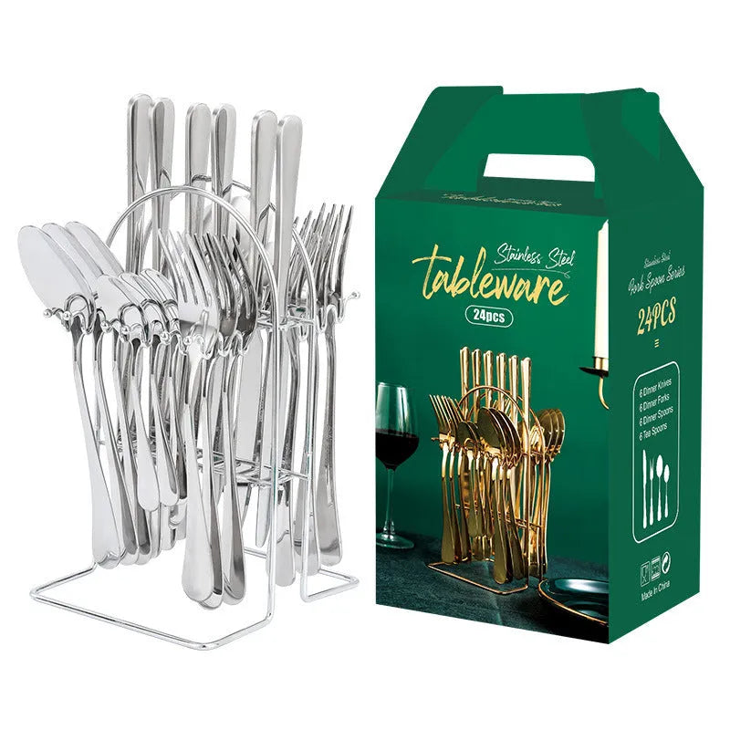 24-piece stainless steel cutlery set with knives, forks, spoons, and teaspoons on a storage rack in a gold finish.