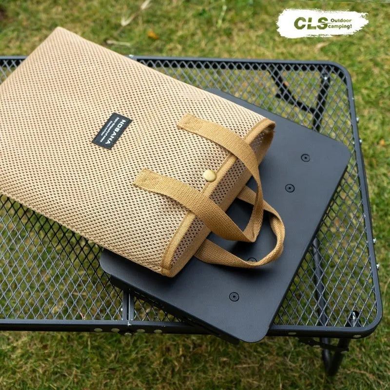 CLS aluminium folding camping stool converted into a small table with a green PU mat top