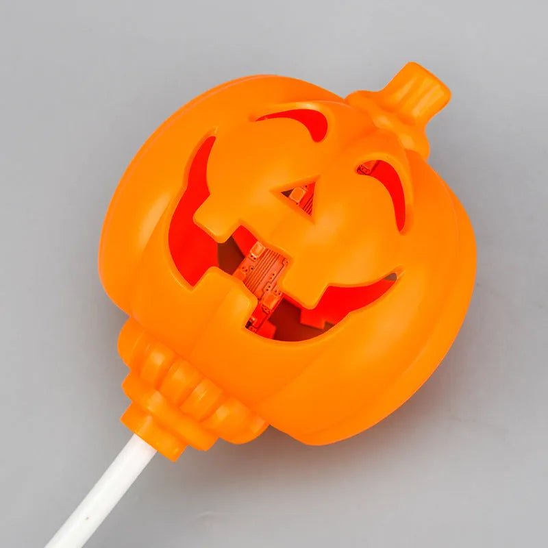 Plastic pumpkin decorative lamp with USB cable, available in purple or yellow light, measuring 22cm tall