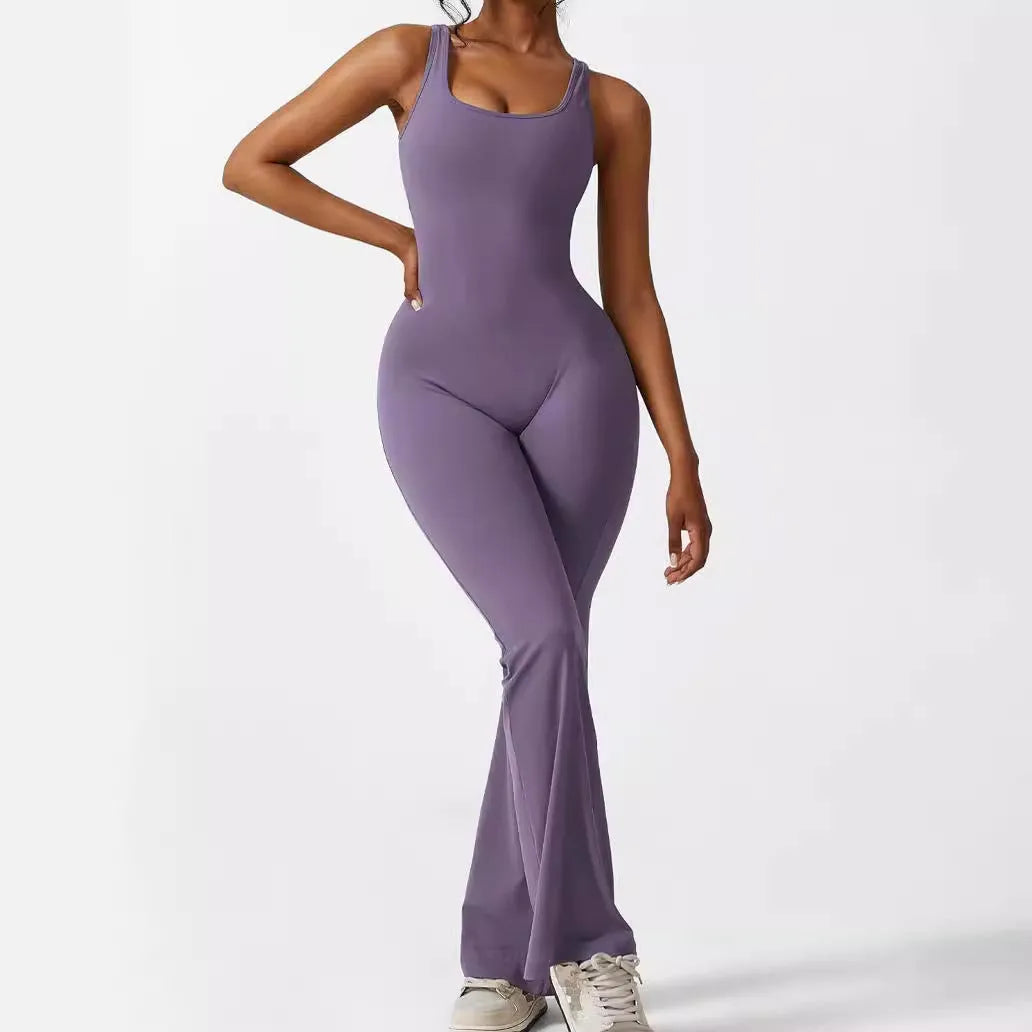 Women's sleeveless flare jumpsuit for yoga in high elasticity polyester fabric.
