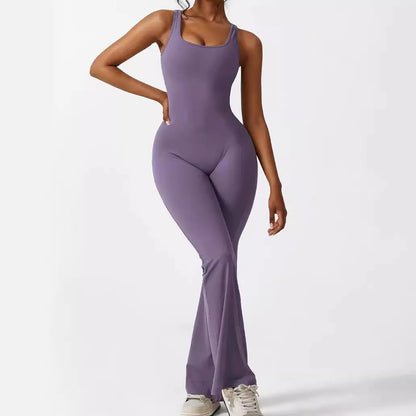 Women's sleeveless flare jumpsuit for yoga in high elasticity polyester fabric.
