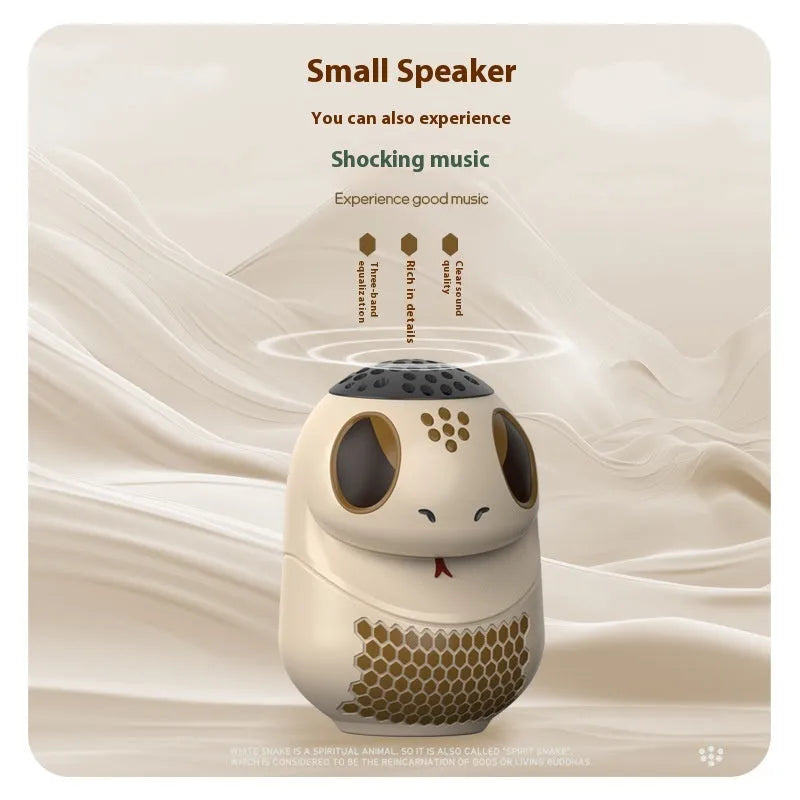 TK900 white cartoon Bluetooth speaker with lighting feature on display