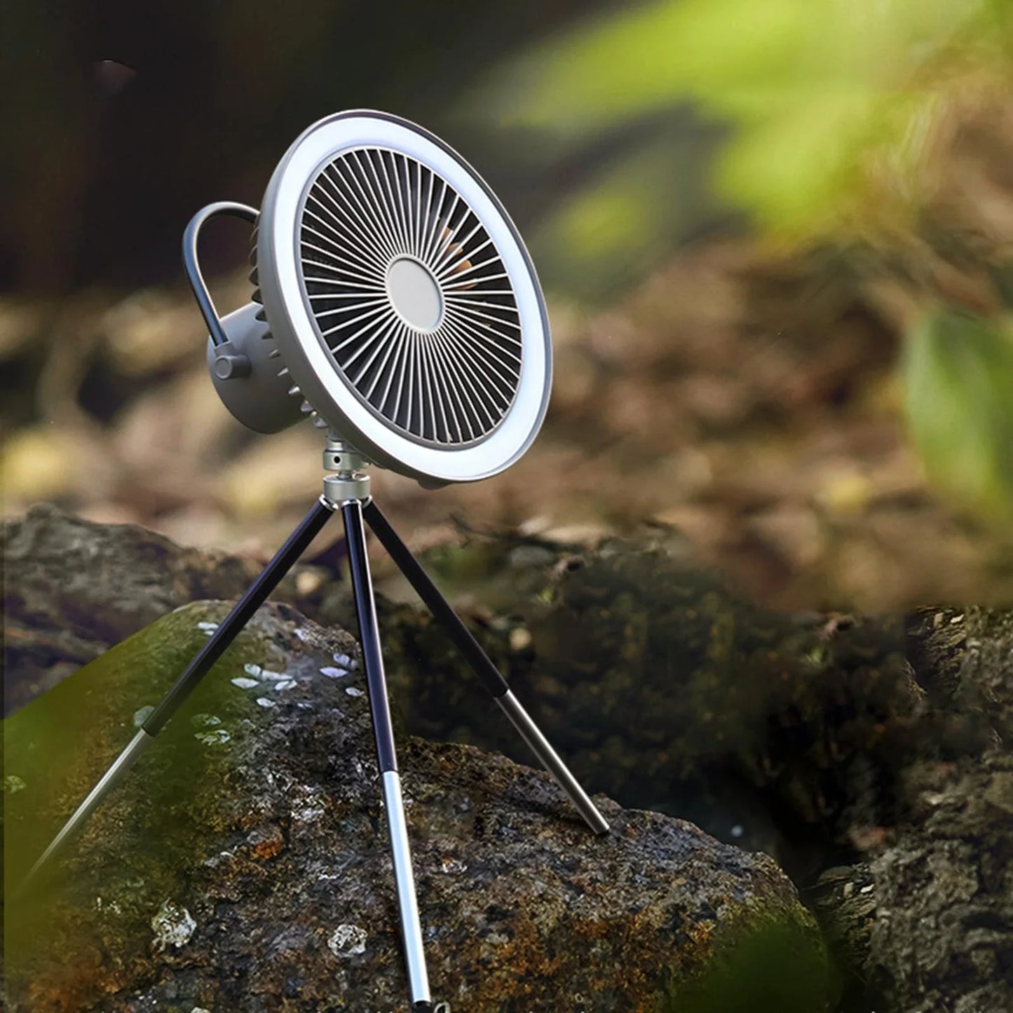 Versatile USB Rechargeable Camping Fan with Tripod Stand and Lantern, offering a premium aluminum alloy construction, 3-in-1 design, and powerful brushless motor for a refreshing outdoor experience.