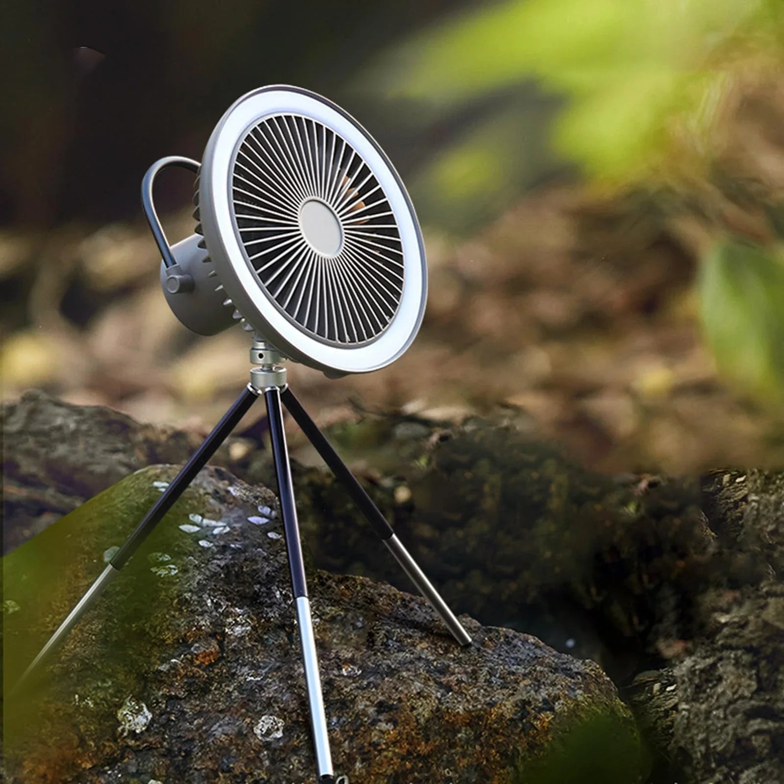 Versatile USB Rechargeable Camping Fan with Tripod Stand and Lantern, offering a premium aluminum alloy construction, 3-in-1 design, and powerful brushless motor for a refreshing outdoor experience.