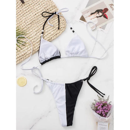 Black and white women's lace-up triangle cup bikini with briefs
