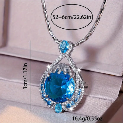 Women's blue crystal necklace with geometric fireworks-cut pendant on water wave alloy chain