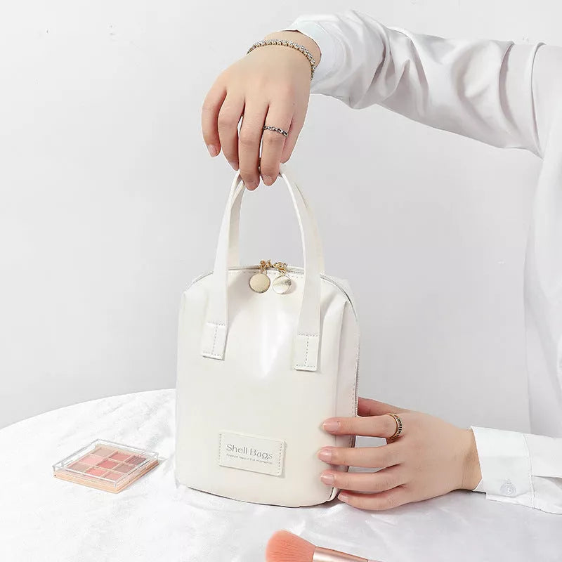 Girly Heart Egg Shell Waterproof Makeup Bag in pink and white with sewing line design