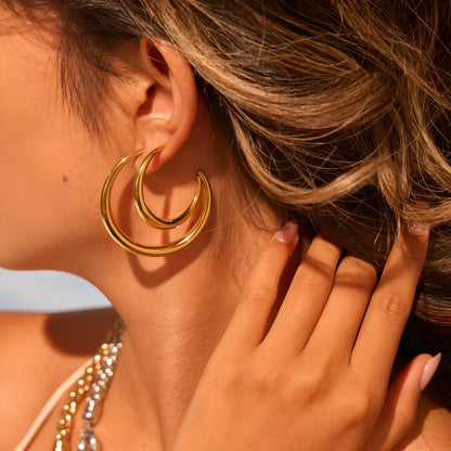 Women's stainless steel hoop earrings in two sizes with gold or steel finish