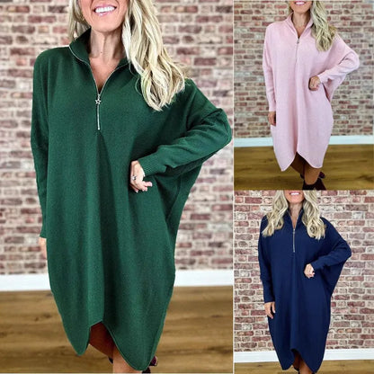 Women's solid colour loose fit knitted dress with raglan sleeves and a front zipper.