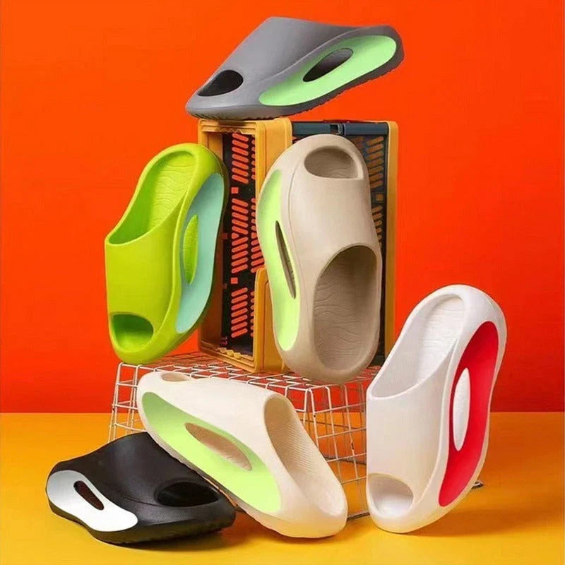 Stylish and comfortable unisex slippers with a unique hollow design, perfect for summer beach and casual wear