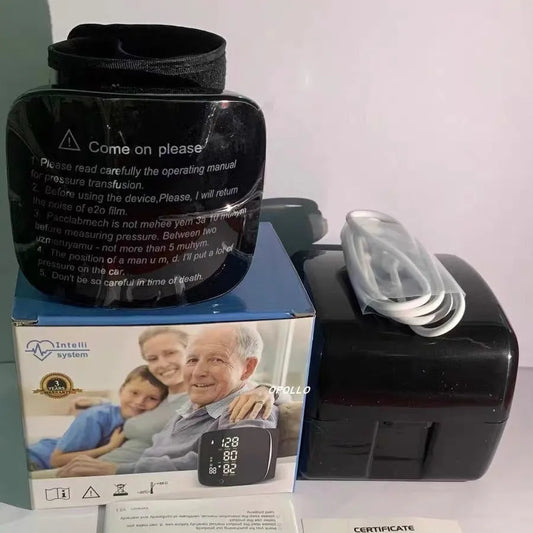 Black wrist sphygmomanometer with USB rechargeable battery and multilingual voice options for blood pressure monitoring