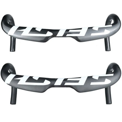 Carbon fibre road bicycle handlebar with ergonomic bent shape, shown in a choice of finishes.