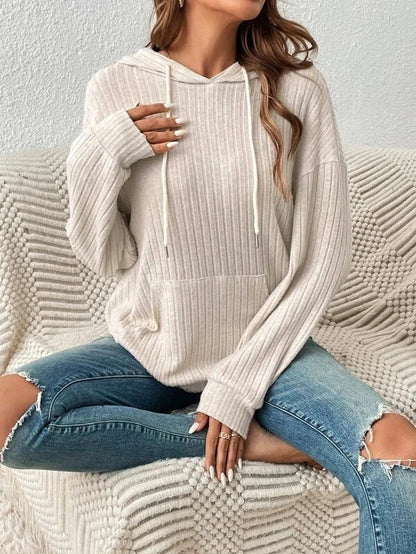 Cozy drawstring hoodie with pockets in various colors, including apricot, green, black, and gray