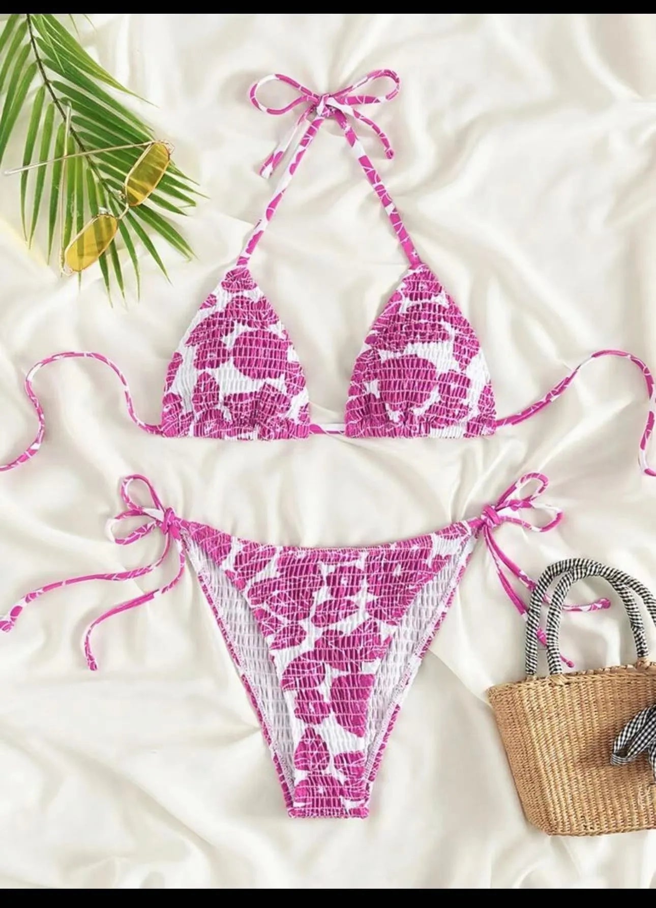 Women's floral halter neck swimsuit set in polyester fabric showing bra top and briefs