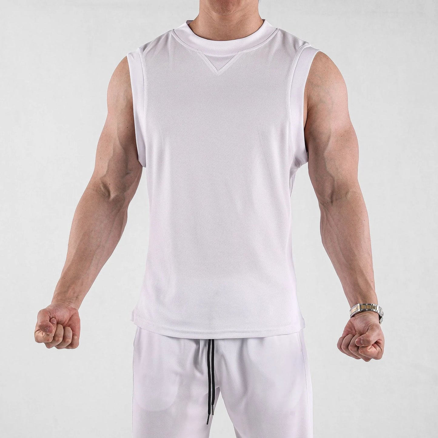 Men's black loose fit polyester fitness vest for summer sports on a white background