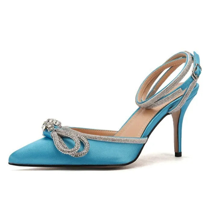 Women's black French style stiletto heel sandals with a silk back bandage and silver buckle closure.