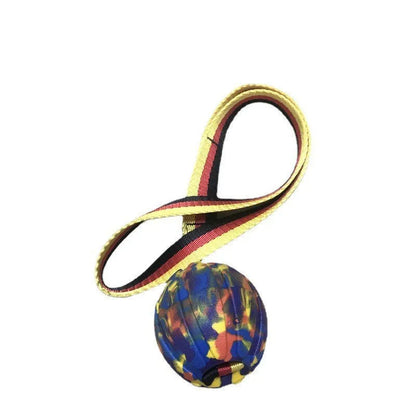 Camouflage and yellow EVA foam floating dog ball with knotted tetherball design.
