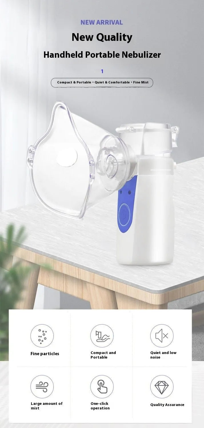 A white columnar handheld USB nebuliser spray machine with a single mist outlet on a table.