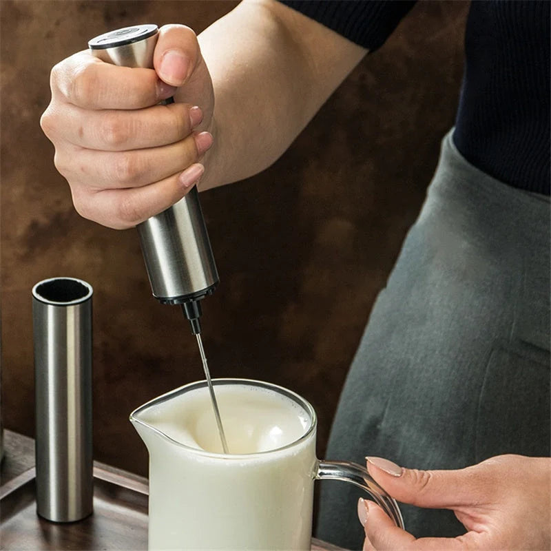 Silver handheld milk frother with 19000RPM speed for quick and efficient frothing