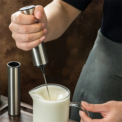 Silver handheld milk frother with 19000RPM speed for quick and efficient frothing