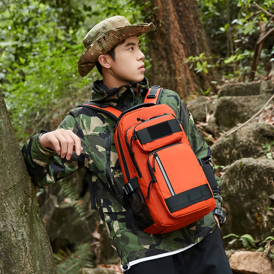 Large orange and black outdoor backpack with 20-35L capacity for hiking and camping