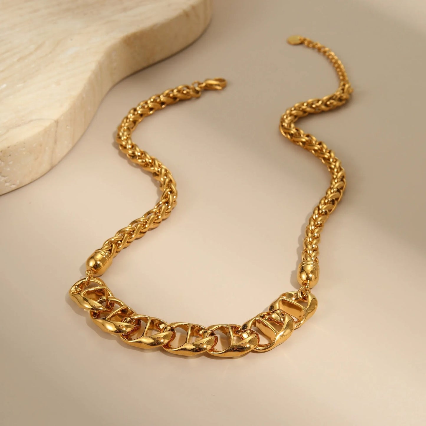 Gold plated stainless steel necklace with geometric pendant on regular chain