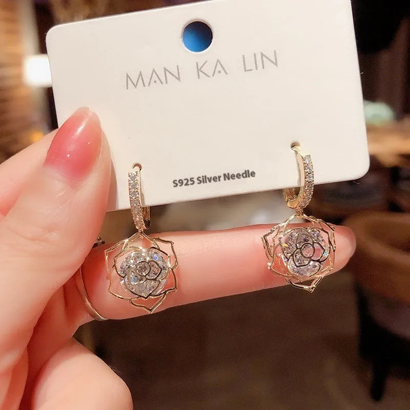 Geometric rose design copper earrings with zircon details in multiple colour options