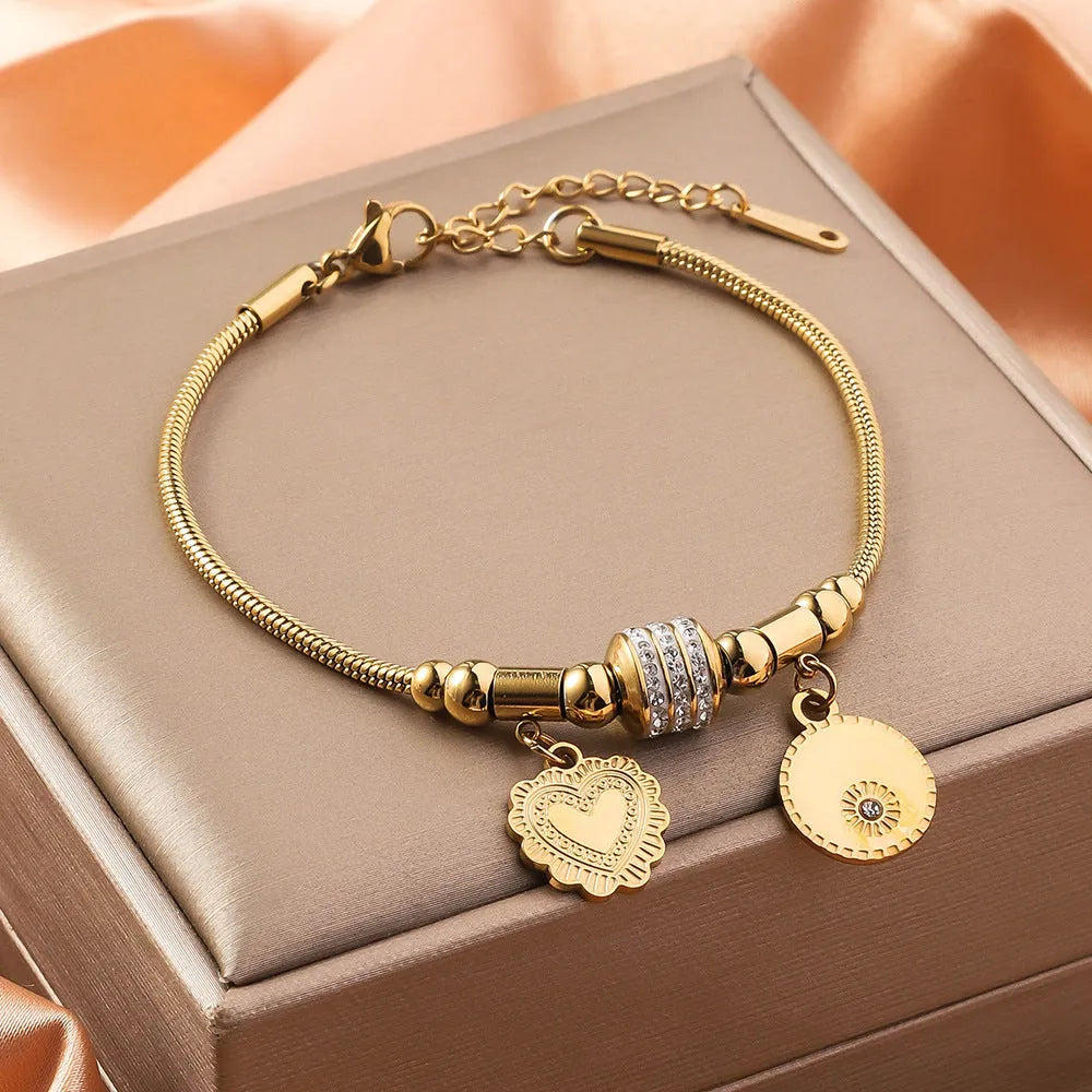 Titanium steel inlaid shell bracelet with electroplated finish showing pattern variation options