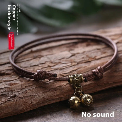 Adjustable nylon rope dog collar with brass bell in black, red, and coffee colour options