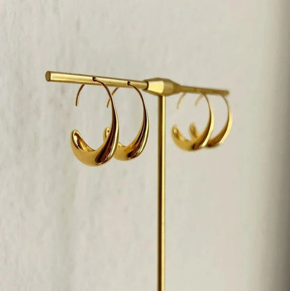 Gold and silver retro fashion earrings with snake design elements and electroplated finish