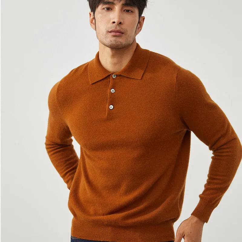 Men's sapphire blue cashmere pullover sweater with a polo collar, laid flat.