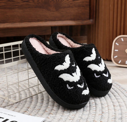 Halloween bat design plush slippers for indoor wear, available in white and black