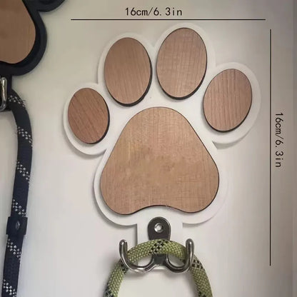 Black and white wooden paw print shaped wall hook for hanging keys or coats