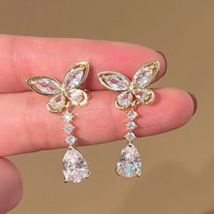 Bow stud earrings with platinum electroplated finish on zinc alloy