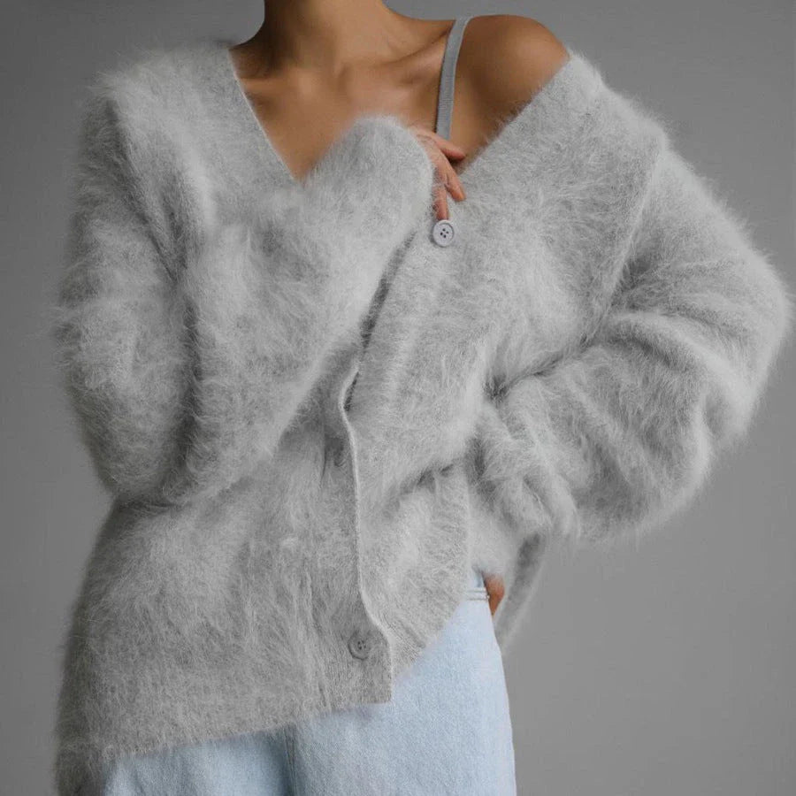 Cozy oversized cardigan with v-neck, button front, and variety of color options for women
